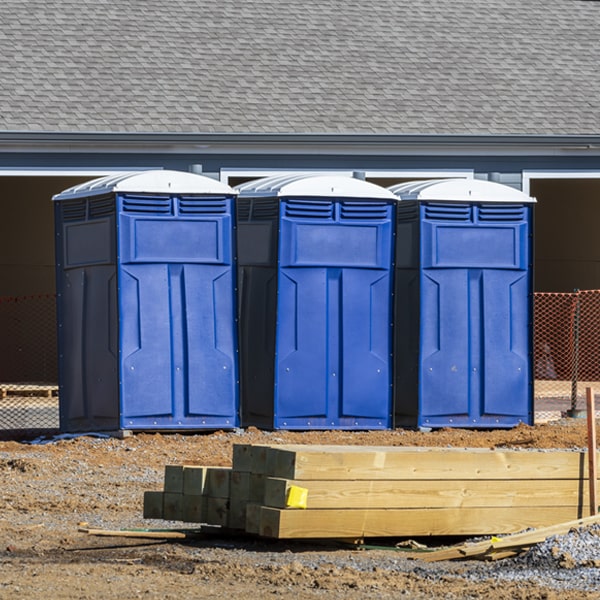 what is the cost difference between standard and deluxe porta potty rentals in Hogansville